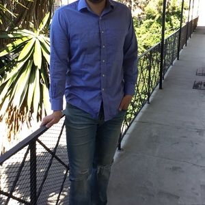 Blue button up shirt in great condition!